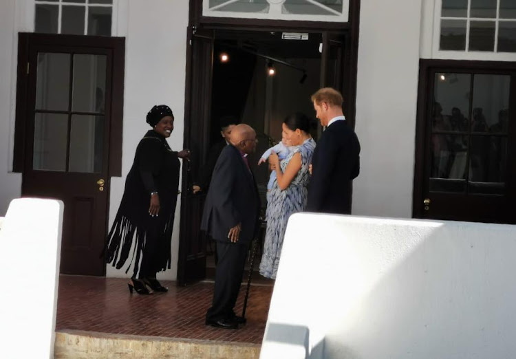 Archbishop Emeritus Desmond Tutu meets baby Archie as the Duke and Duchess of Sussex arrive at the Old Granary Building on September 25 2019.