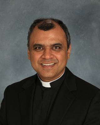 Photo of Father Sunoj Thomas, Pastor at Saint Charles Borromeo Parish