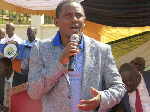 Gem MP Elisha Odhiambo addressing residents in Siaya town during a past meeting.