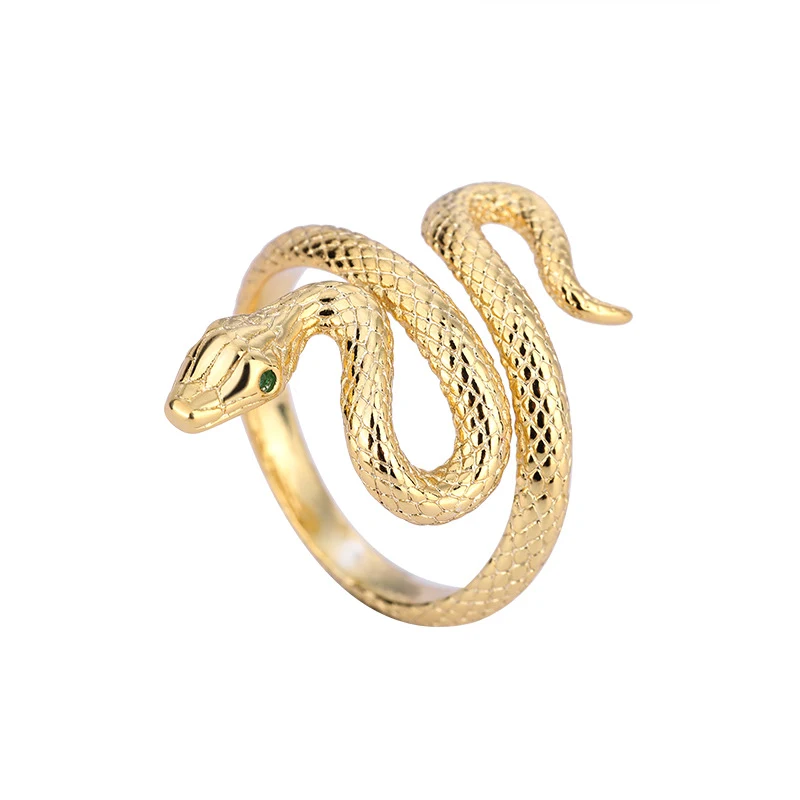 Bague serpent enroulée avec œil vert diamant. Un bijou raffiné pour femmes. Parfait pour un cadeau précieux et un look tendance et original.