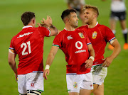 Tom Curry of the British & Irish Lions being congratulated after scoring his try during the Tour match between Cell C Sharks and British and Irish Lions at Loftus Versfeld Stadium on July 10, 2021 in Pretoria, South Africa. 