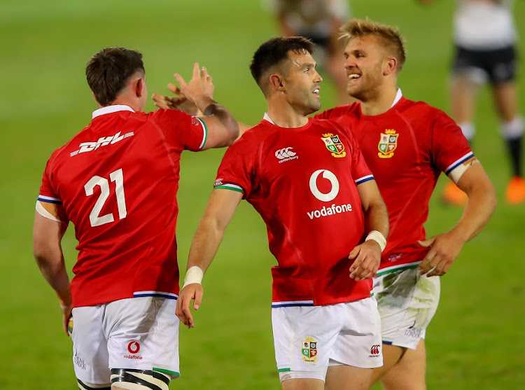 Tom Curry of the British & Irish Lions being congratulated after scoring his try during the Tour match between Cell C Sharks and British and Irish Lions at Loftus Versfeld Stadium on July 10, 2021 in Pretoria, South Africa.