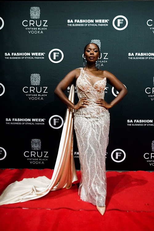 Actor Nambitha Ben-Mazwi at the SAFW opening party red carpet.