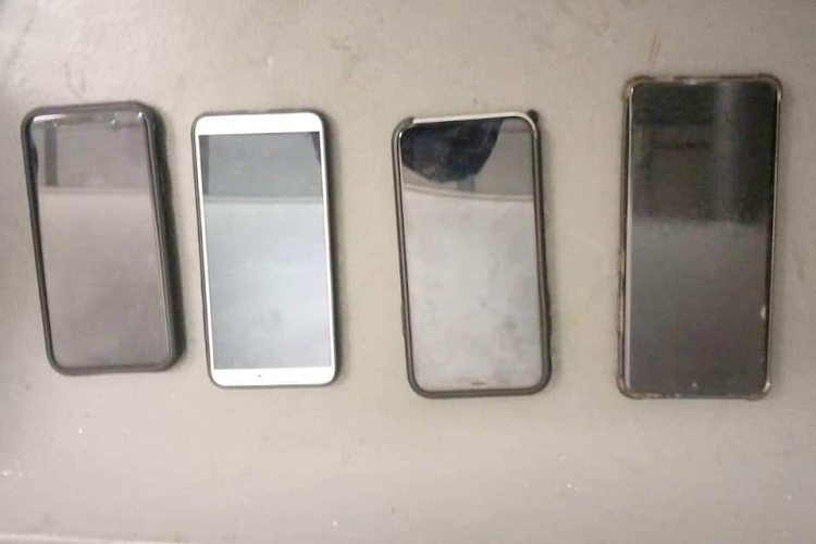 Two men were found with cellphones that did not belong to them when they were apprehended for allegedly picking the pockets of spectators at Cape Town Stadium on Saturday.