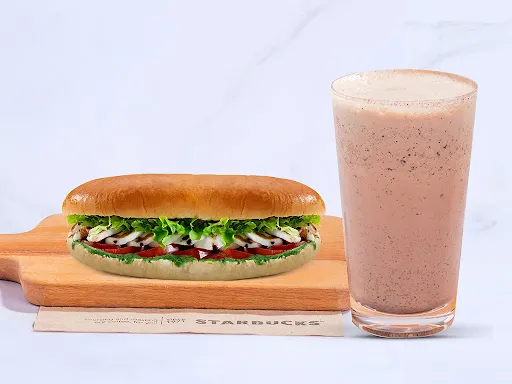 Tall Chocolate Milkshake With Pesto & Mozzarella Sandwich In Panini