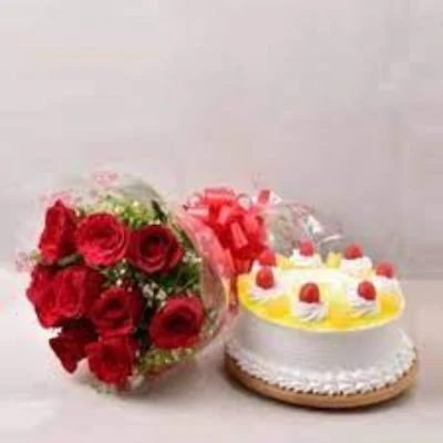 Pineapple Cake And 10 Red Roses Bunch