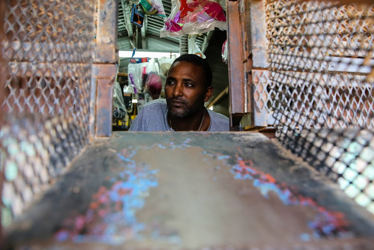 Happy Mathews, 23, had to hurry and remove goods from his shop in Chatty after looting in the northern areas on April 15