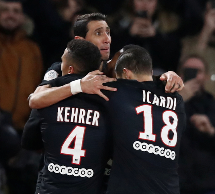 Paris St Germain's Thilo Kehrer celebrates with Angel Di Maria and Mauro Icardi