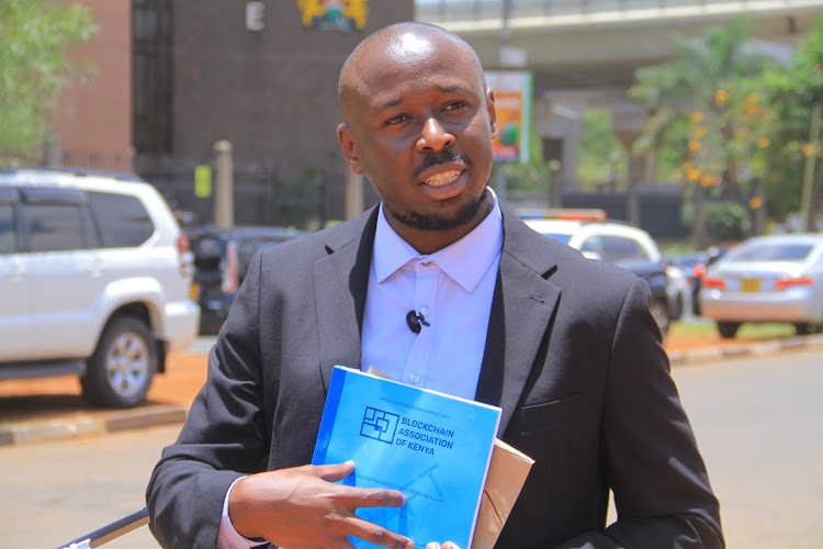 Chair of the Blockchain Association of Kenya, Michael Kimani after submitting the draft Virtual Asset Service Provider (VASP) to the clerk of the national Assembly