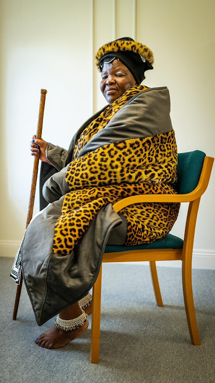 Princess Zukiswa Kona holds a stick that was once owned by Nkosi Jongumsobomvu Maqoma while the warrior chief was held at Robben Island.