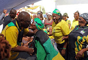 01 October 2022.President Cyril Ramaphosa seen kissing members of the community in Kimberley during the Letsema campaign in the Northern Cape, where he celebrated the 82th birthday of Ouma Martha Louw in Donkerhoek, Galeshewe  . Picture: Thapelo Morebudi./The Sunday Times/Times Live.