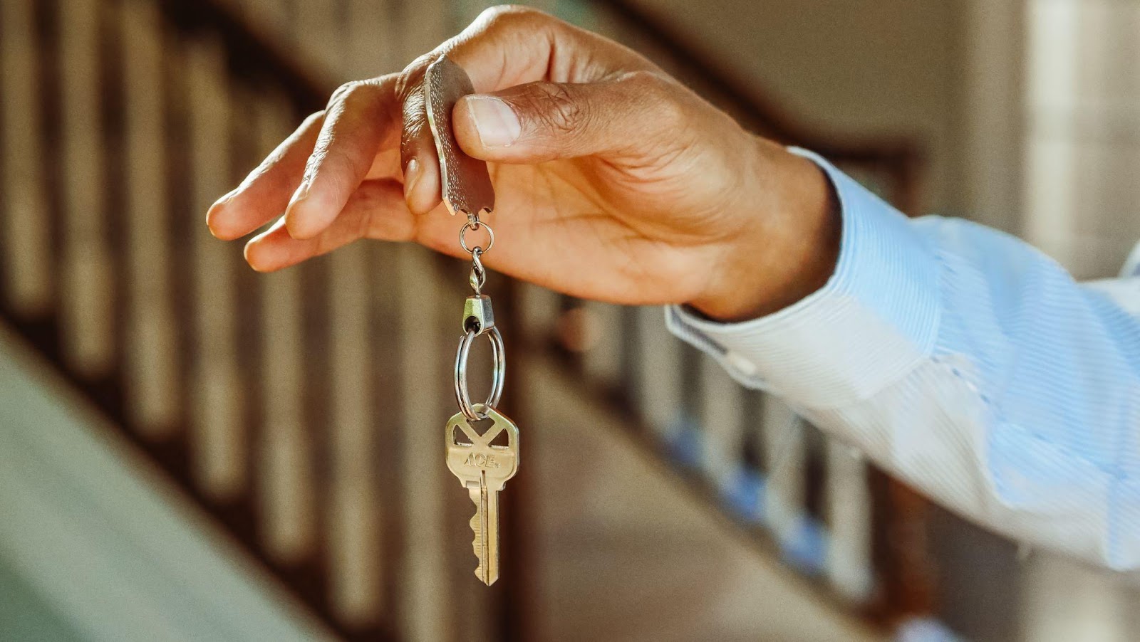 a person holding keys