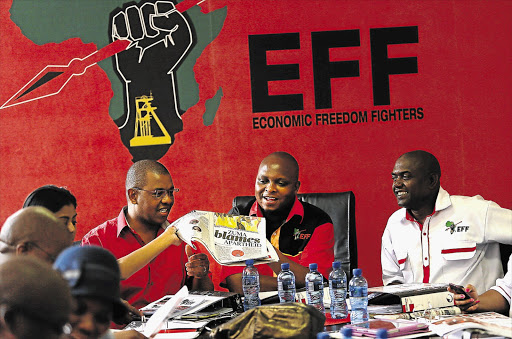 Dali Mpofu, Floyd Shivambu and Godrich Gardee at a Economic Freedom Fighters meeting. File photo