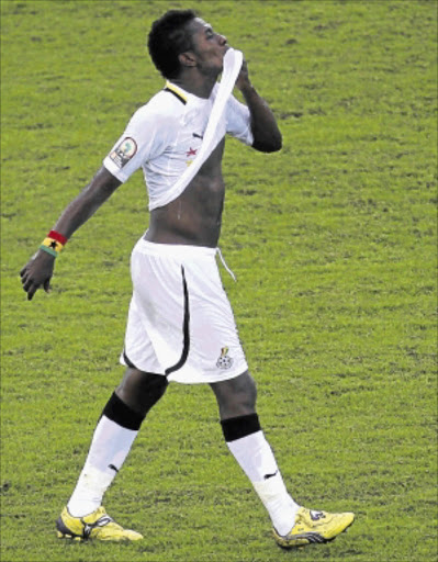 MORTIFIED: Asamoah Gyan of Ghana reacts after Zambia's goalkeeper Kennedy Mweene catches his penalty. PHOTO: REUTERS