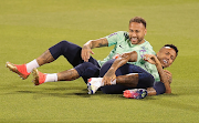 Neymar (top) and Eder Militao of Brazil attend a training session in Doha, Qatar on November 21 2022. Brazil face Serbia in their World Cup 2022 Group G match on November 24. 