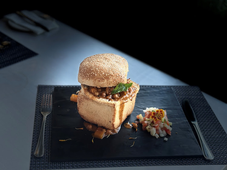 Chef Hill's renowned butternut and chickpea coconut curry Bunny Chow