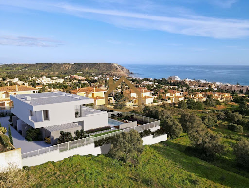 Modern villa with sea view pool in this luxury house for sale in Luz ($2,026,190 - 205 m²)
