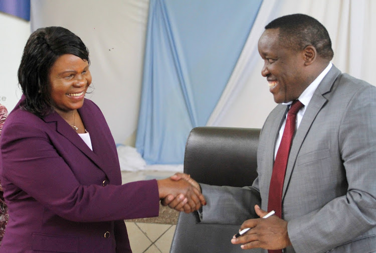 Education CAS Collet Suda (Left) with PS State Department For Post Training & Skills Development Alfred Cheruiyot.