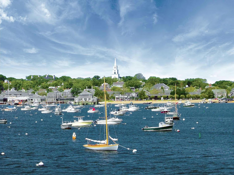 Schooners and beautiful colonial houses will catch the attention of guests aboard American Cruise Lines in Nantucket Harbor.