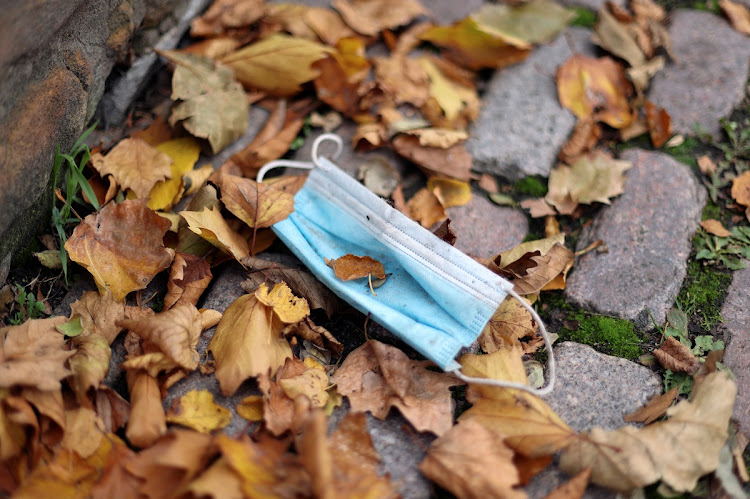 A protective face mask is pictured on a street, following the outbreak of the coronavirus disease (COVID-19), in Nottingham, Britain October 12 2020.