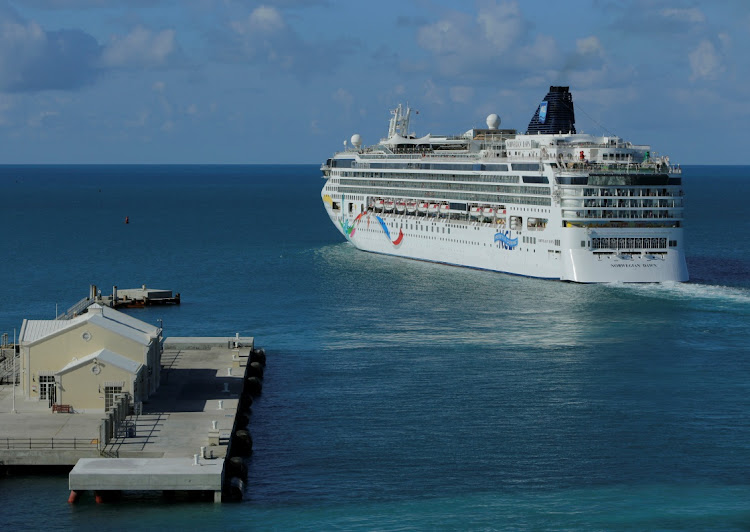 The cruise ship of the Norwegian Cruise Line Norwegian Dawn departs from the port of Hamilton, Bermuda. Picture: GARY CAMERON/REUTERS/FILE