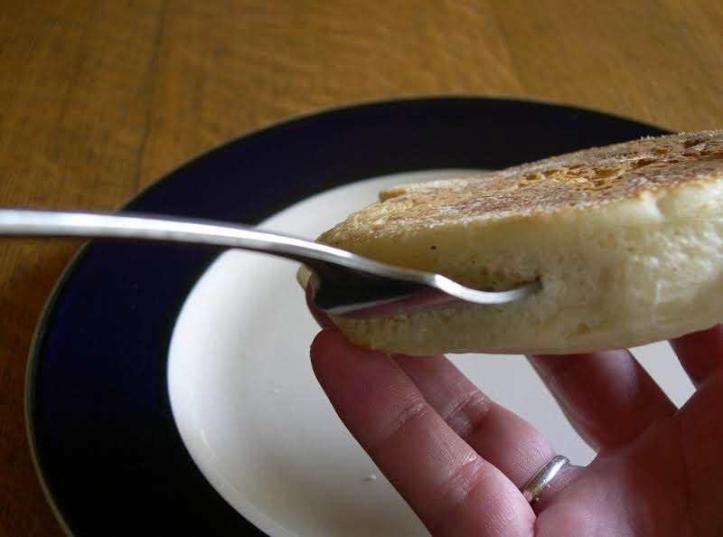 Using A Dinner Fork, Evenly Poke The Muffin All The Way Around Instead Of Using A Knife, Which Will Deflate The Nooks And Crannies.