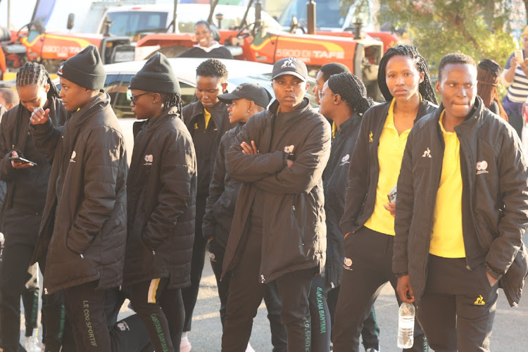 Banyana Banyana players arrive at Tsakane Stadium in Ekurhuleni during the first half of the World Cup send-off match where they were replaced by a makeshift team after a contractual dispute with the South African Football Association.