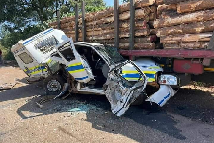 Policemen escaped unhurt as they conducted a routine traffic check when a truck crashed into their vehicle.