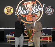 Kaizer Chiefs coach Steve Komphela and Orlando Pirates counterpart Kjell Jonevret shake hands at the Carling Black Label Cup launch in Johannesburg on Tuesday. Picture credits: Backpagepix