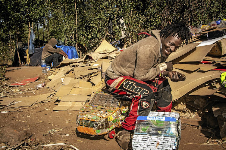 Moses Rambao, a member of the Waterkloof Bagerezi community, makes art from waste.