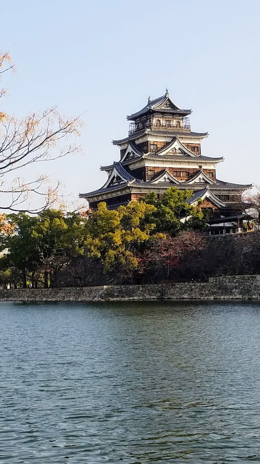 Hiroshima Castle, one of the free things to do in Hiroshima if you just walk around the moat and park area to see the castle on the outside, there is only a small fee to enter the inside of Hiroshima Castle itself