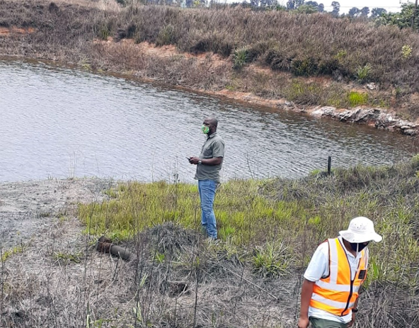 Officials of the department of water and sanitation inspecting an area around a colliery in Middelburg and the dams affected by an acid water spillage in 2020. File photo.