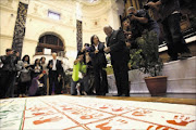 Cape Town mayor Patricia de Lille and Archbishop Emeritus Desmond Tutu speak to reporters after unveiling the 'Mandela Legacy Canvas', which will be auctioned on Saturday to raise funds for the Nelson Mandela Foundation  See Auctions Page Picture: SHELLEY CHRISTIANS