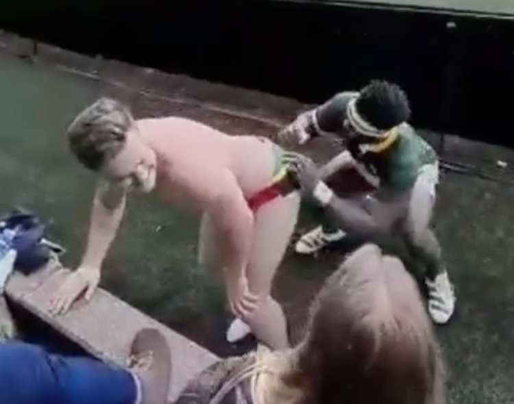 A still image captured from the video showing Springbok captain Siya Kolisi signing a fans SA flag themed underwear.