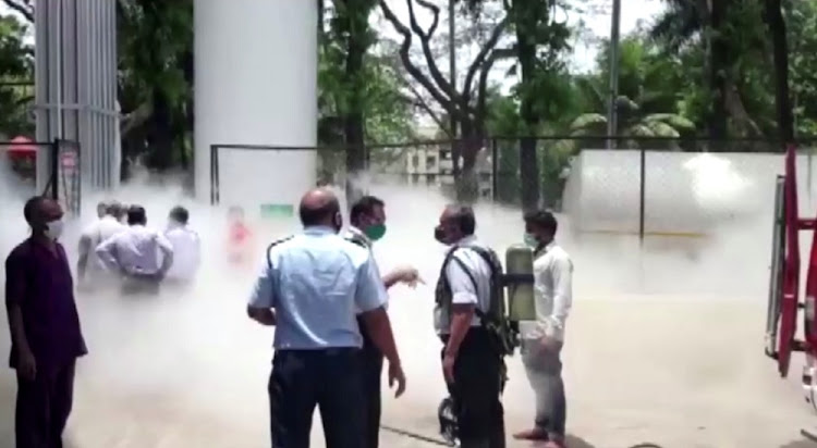 An oxygen tanker leaks at a hospital premises where Covid-19 patients died due to a lack of oxygen in Nashik, India, on April 21 2021 in this still image taken from video.