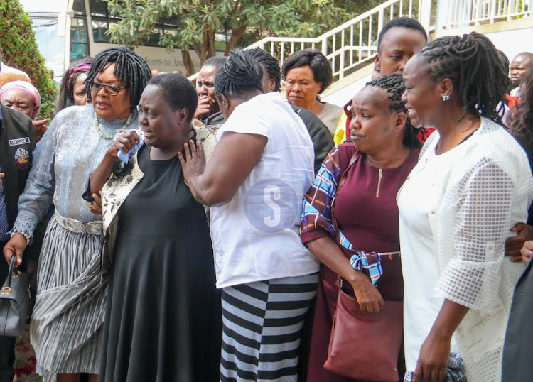 Family and friends during the requiem mass of Kenya Prisons commissioner Isaiah Osugo at Maxwell SDA on January 17.