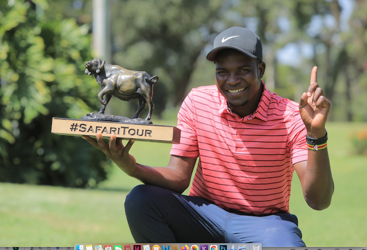 : Robinson Chinhoi poses with the winners trophy