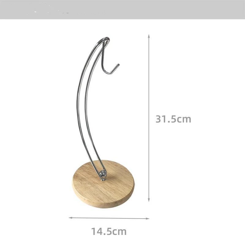 Support à bananes de cuisine avec base en bois massif et fer. Gardez vos bananes fraîches et à portée de main avec ce support élégant et durable.
