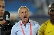 Stuart Baxter, head coach of South Africa instructs his players to thank fans after the 2019 Africa Cup of Nations Finals quarterfinal game between Nigeria and South Africa at Cairo International Stadium in Egypt on 10 July 2019.