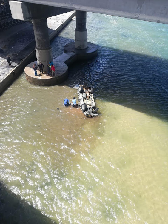 Search and rescue members at the scene of the fatal accident at the Swartkops bridge in Port Elizabeth in October.