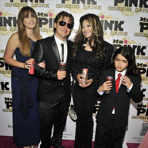 Paris Jackson with Prince Michael, La Toya and Blanket. File photo