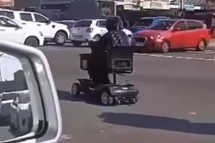 In a video clip the woman is in a lane attempting to turn into Sparks Road.