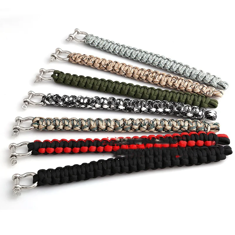U-vormige armband met enkele gesp van legering, snelsluiting & parachute-koord. Outdoor camping, noodsituaties, binden en wikkelen.