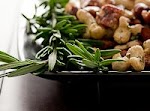 Spicy Rosemary Roasted Nuts | Cocktail Nibbles was pinched from <a href="http://gourmandeinthekitchen.com/2010/spicy-rosemary-roasted-nuts-recipe/" target="_blank">gourmandeinthekitchen.com.</a>