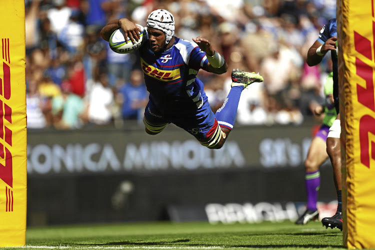 Nizaam Carr in a spectacular drive over the tryline - except this try wasn't allowed in the Stormers' victory over the Blues at Newlands yesterday. Picture: Nic Bothma/EPA