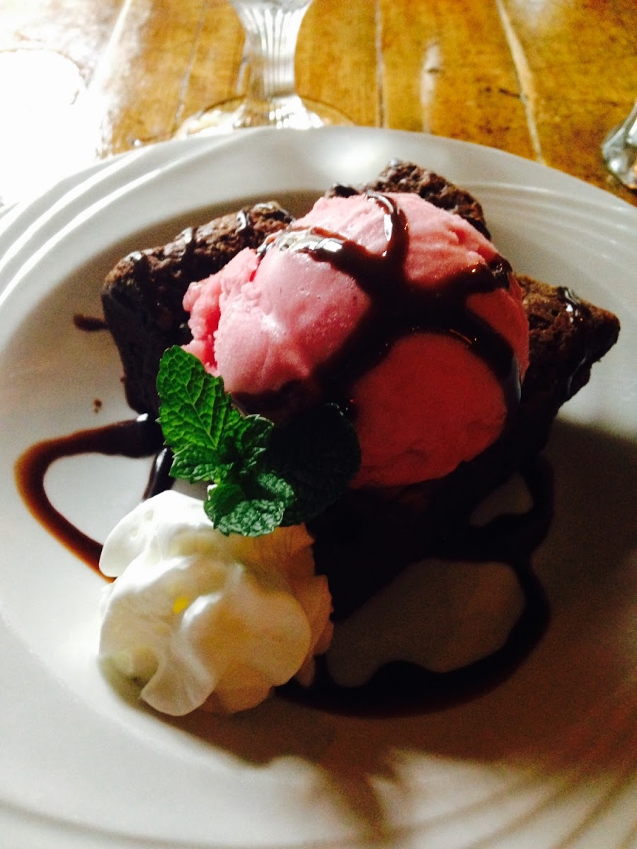 Flourless chocolate and walnut brownie with berry sorbet