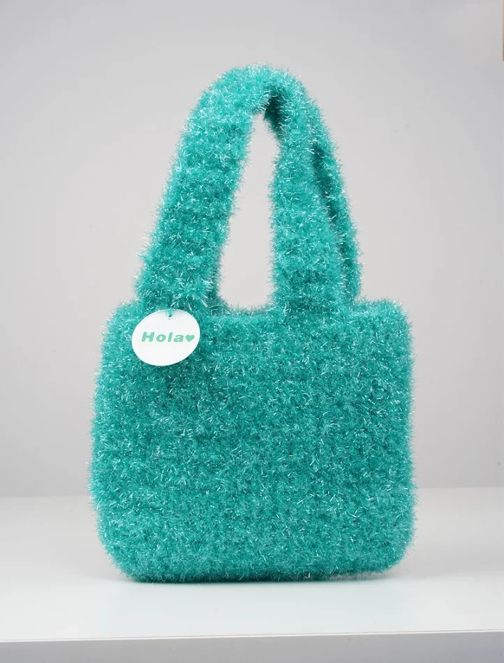 Retro-gebreide handtas voor dames. Een stijlvolle en praktische tas voor dagelijks gebruik, perfect om je essentials in mee te nemen met een vintage look.