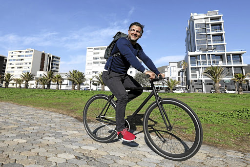 John Sanei swapped his sports car for a bike.