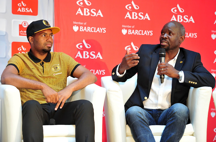 A file photo of former Kaizer Chiefs head coach Steve Komphela (R) and current club captain and goalkeeper Itumeleng Khune (L) speak during the Orlando Pirates press conference at the Absa Tower in Johannesburg. Komphela resigned in a huff on April 21 2018 after a Nedbank Cup semifinal defeat to eventual winners Free State Stars.