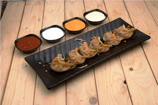 Veg Schezwan Steamed Momos (6 Pcs)